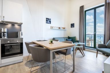 Krusespeicher - Top-Apartment mit Galerieschlafzimmer, Dachterrasse und einmaligem Hafenausblick