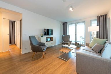 Apartmentvilla Anna See - Top Apartment in Strandnähe mit Loggia, Strandkorb, zwei Bädern & Sauna im Haus!